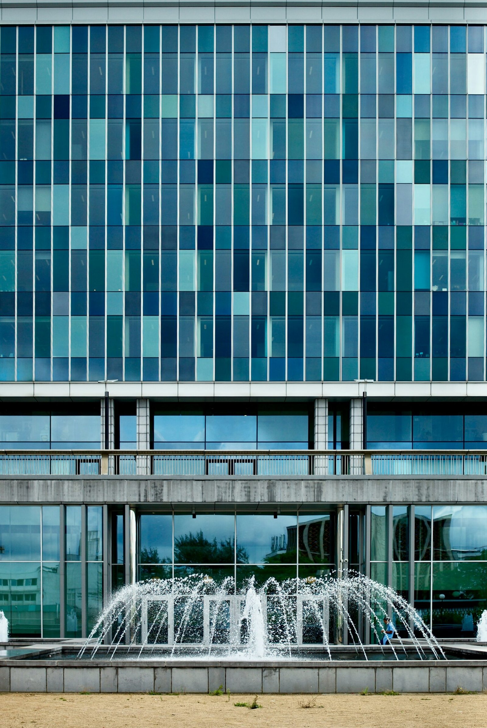 a fountain in front of a building