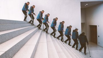 people walking in staircase